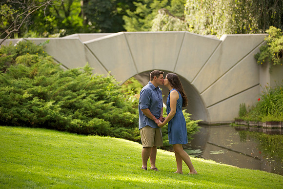 Engagement portrait by sun bridge at Dow Gardens in Midland, Michigan